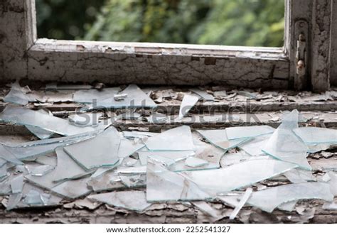 smashed glass window  wooden frame stock photo  shutterstock