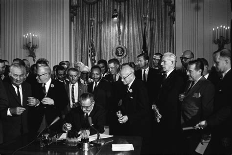 President Lyndon Baines Johnson signing the Civil Rights act of 1964 ...