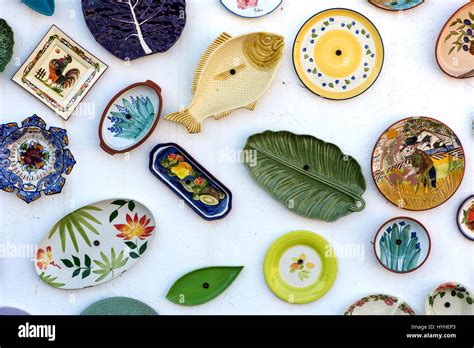 Hand Painted Traditional Portuguese Pottery At The Wall Of The Pottery