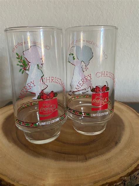 Vintage 1977 Coca Cola Glasses Set Of Two 2 Holly Hobbie Christmas Is A