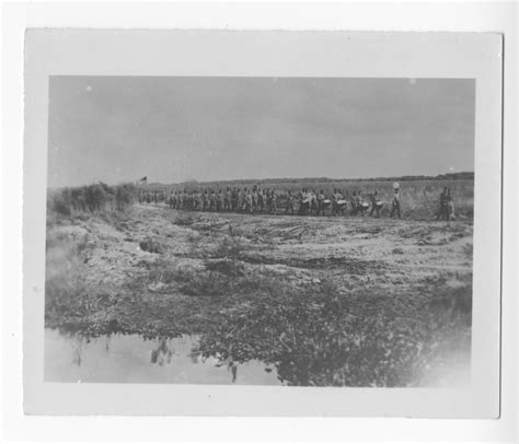 Servicemen Marching Down A Road The Portal To Texas History