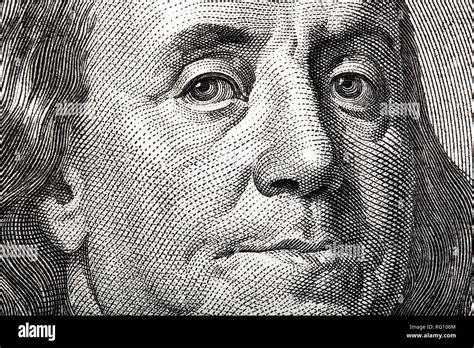 Portrait Of Ben Franklin On The US 100 Dollar Bill In Macro For Your