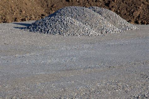 Piles Of Gravel On A Construction Site With Copy Space On The Bottom