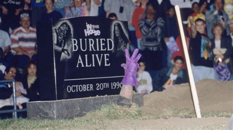 The grave history of Buried Alive Matches | WWE