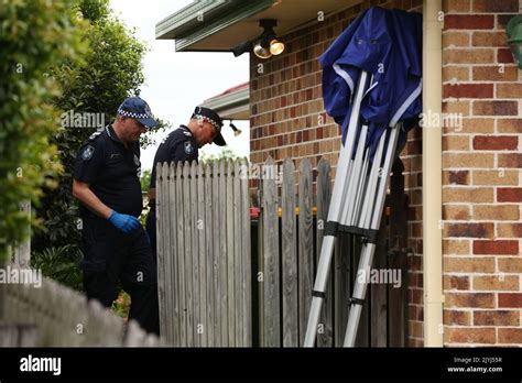 Queensland Police And Forensics At A House That Is The Scene Of Double