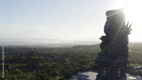 Aerial view of Garuda Wisnu Kencana statue (also GWK statue) at sunrise ...