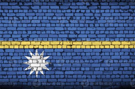 Nauru Flag Is Painted Onto An Old Brick Wall Stock Photo At