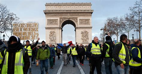 Yellow Vests Descend On Paris As Police Arrest Hundreds And Fire Tear