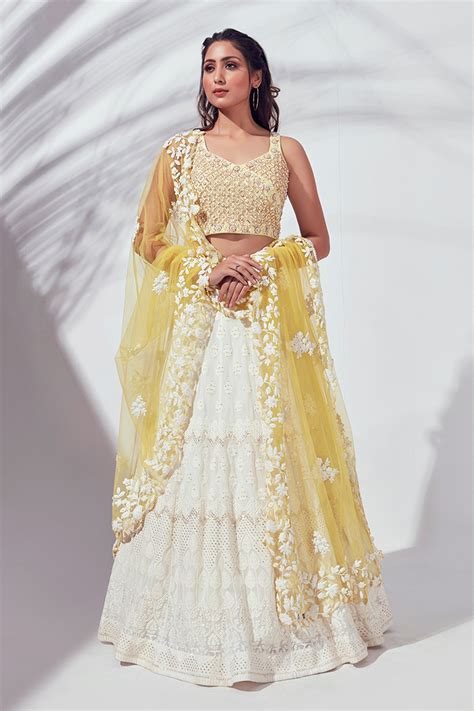 Buy White Tussar Silk Embroidered Floral Motif V Neck Lehenga Set For