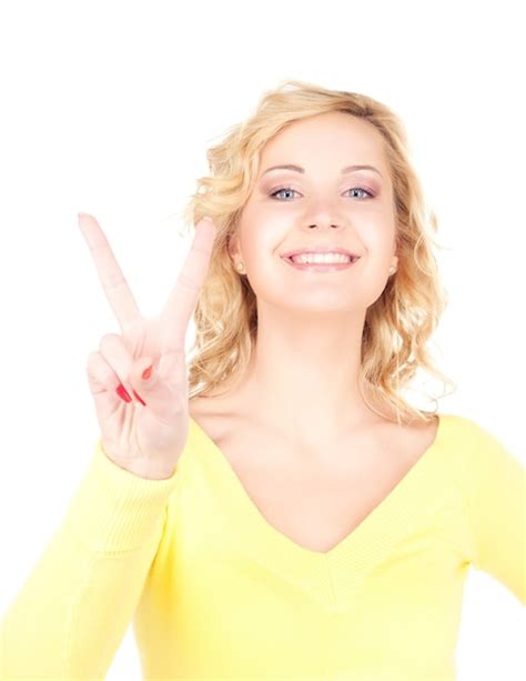 Premium Photo Bright Picture Of Lovely Woman Showing Victory Sign