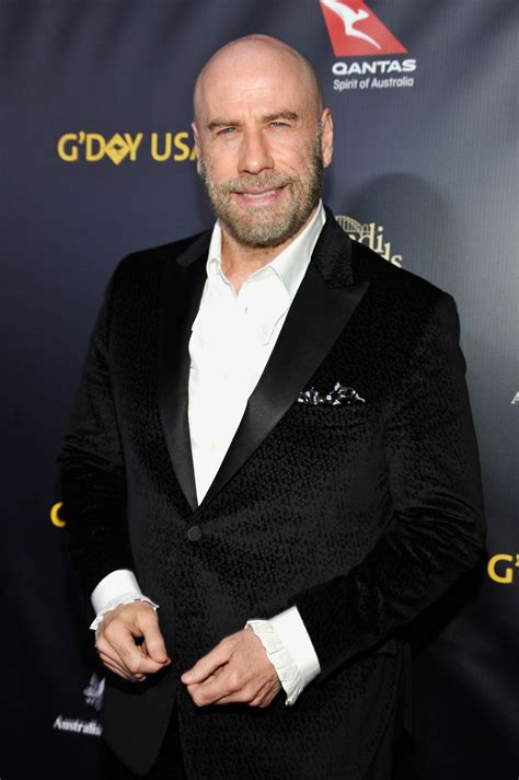 John Travolta Debuts New Shaved Head