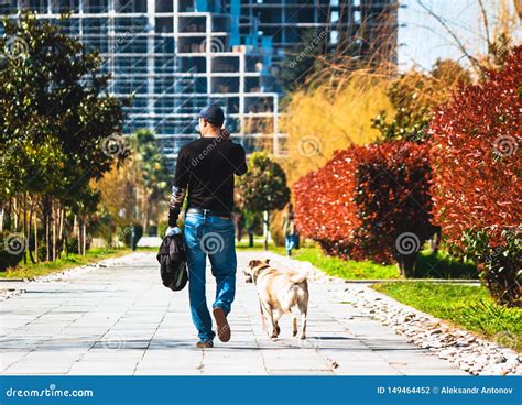 Batumi Georgia April 09 2019 A Man And His Dog For A Walk In The