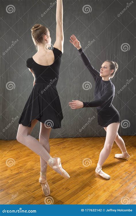 Two Young Woman Ballet Dancers In A Studio Photo Session Stock Photo