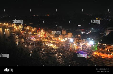 Devotees Gather On The Ghats Of The River Ganges For An Evening Prayer