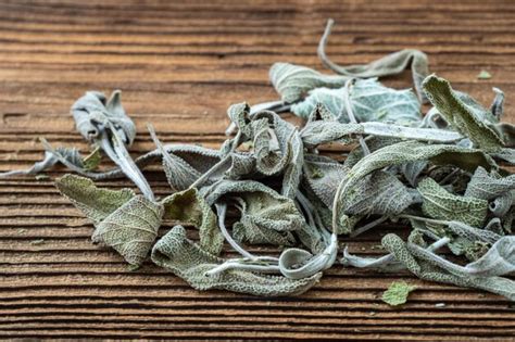 Premium Photo Dried Sage Leaves On Dark Rustic Wooden Background