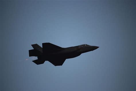 F22 Raptor Silhouette Photograph by Bill Knopp - Pixels