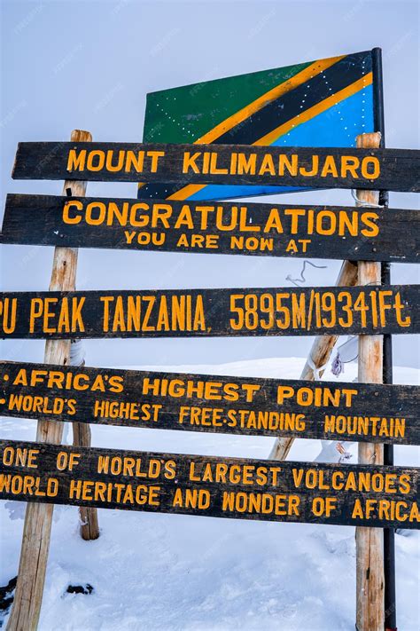 Premium Photo Uhuru Peak Sign Mtkilimanjaro The Top Of Africa