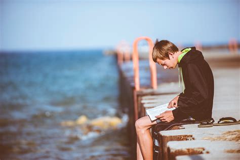 Free Images Man Sea Ocean Book Morning Reading Romance