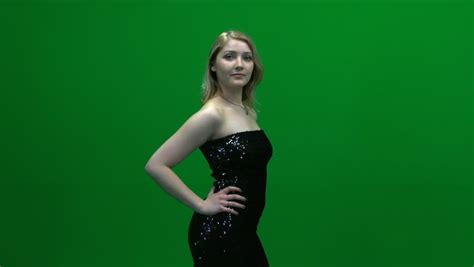 Fashion Model Posing Against Green Screen Women In Elegant Dress