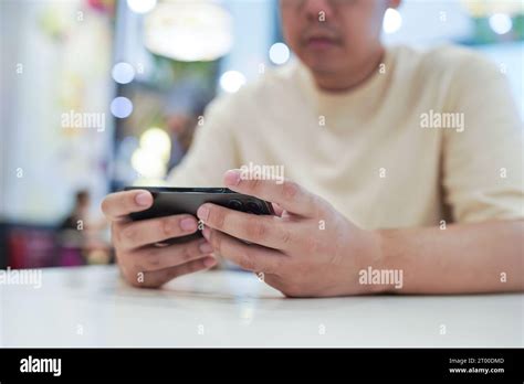 Man Playing Game On Mobile Phone Gamer Boy Playing Video Games Holding
