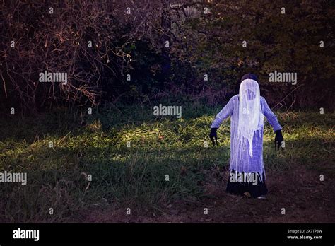 Creepy Scary Monster Ghost Standing In Woods Stock Photo Alamy