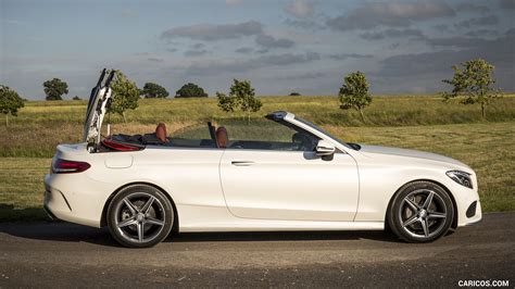 2017 Mercedes-Benz C-Class C220 d Cabriolet (UK-Spec, Diesel) - Top in Action - Side | Caricos