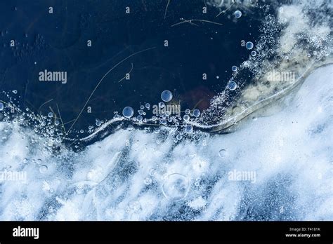 Frozen Air Bubbles In Ice Stock Photo Alamy