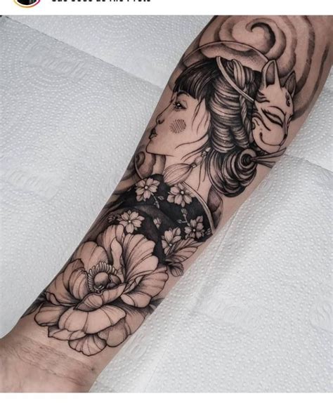 A Woman S Arm With Flowers On It And A Goat In The Background Done By