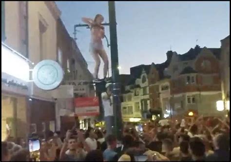 England Fan Stuns Crowds With Pole Dance Routine Ft Up A Lamppost