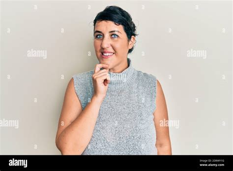 Plus Size Brunette Woman Wearing Casual Clothes Smiling Looking Confident At The Camera With