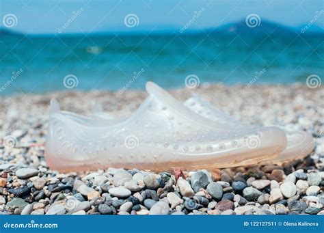 Water Shoes on Beach. Holiday Concept Stock Image - Image of rocky ...