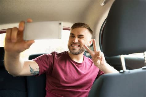 Happy Young Man Taking Selfie In Car Stock Photo Image Of Road