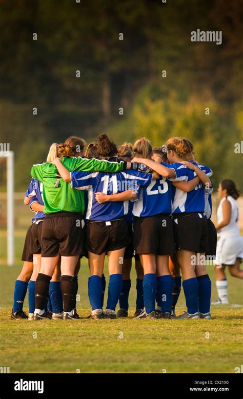 Womens College Soccer Team In A Huddle Between Halves Stock Photo Alamy