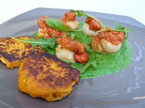 Noix De Saint Jacques Gratinees Au Chorizo Creme De Roquette Blinis