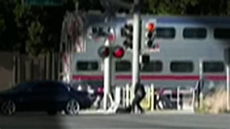 Cop Saves Man From Oncoming Train With Just Seconds To Spare Latest