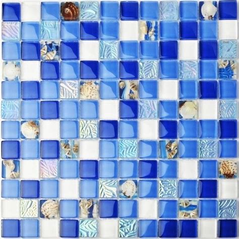 Blue And White Tile With Shells On It