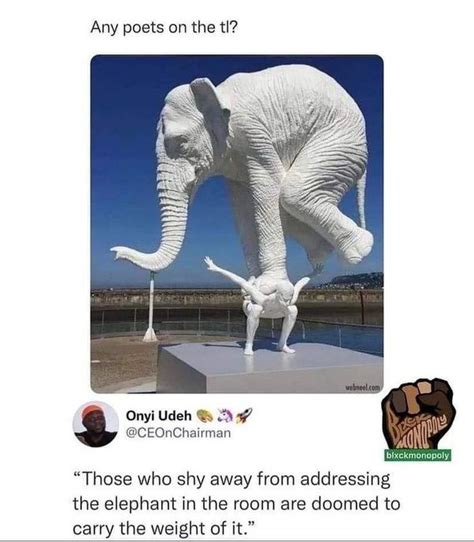 An Elephant Standing On Top Of A White Block Next To Another Elephant