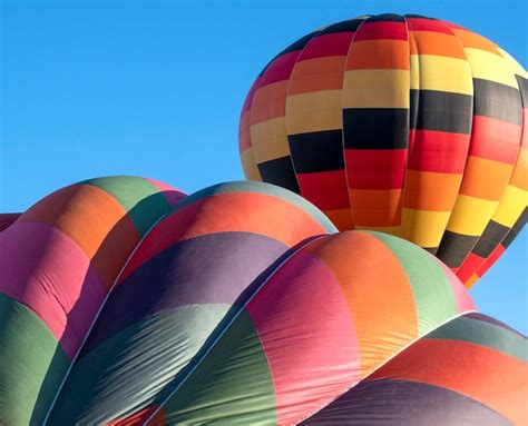 Premium Photo Balloon Festival Flying Balloons In The Blue Sky