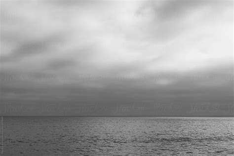 "Overcast Sky And Vast Ocean" by Stocksy Contributor "Rialto Images" - Stocksy