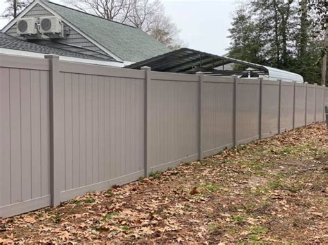 Gray Vinyl Fence in Mathews , VA | Fence Scapes, LLC