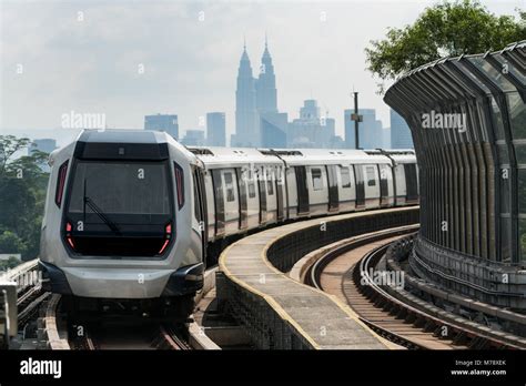 Kuala Lumpur Mass Rapid Transit (MRT) train approaching towards camera ...