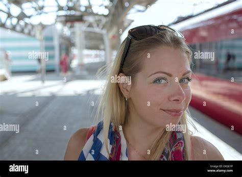 Young Woman At Train Station Stock Photo Alamy