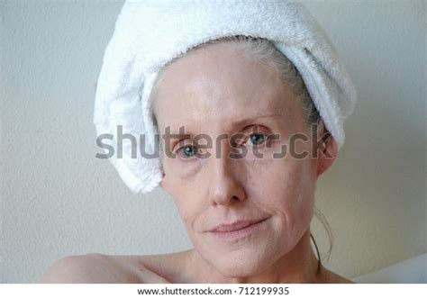 Mature Female Blond Beauty Expressions Indoors Stock Photo