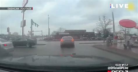 Police Dashcam Reveals Reckless Driver Crashing Into Medical Van