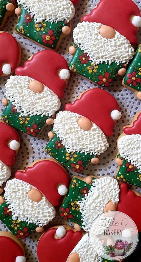 Decorated Christmas Cookies With Santa Clause On Them