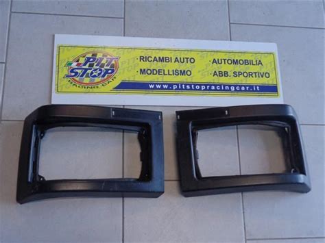 COPPIA CORNICI FANALI POSTERIORI AUTOBIANCHI A112 5SERIE DAL 80 AL