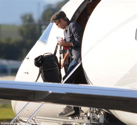 Harry Styles And One Direction Band Mates Arrive At Glasgow Airport In