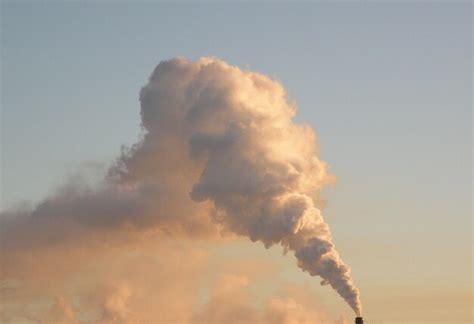 Premium Photo Smoke Emitting From Chimney Against Sky