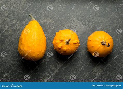 Overhead Of Three Yellow Bumpy Squash Stock Image Image Of