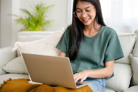 Smiling Young Asian Woman Working On Laptop At Home Stock Image Image